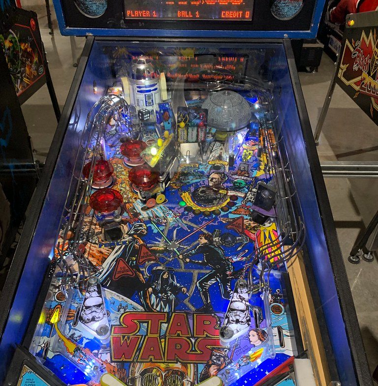 Star Wars pinball playfield with R2-D2, the Death Star and pop bumpers
